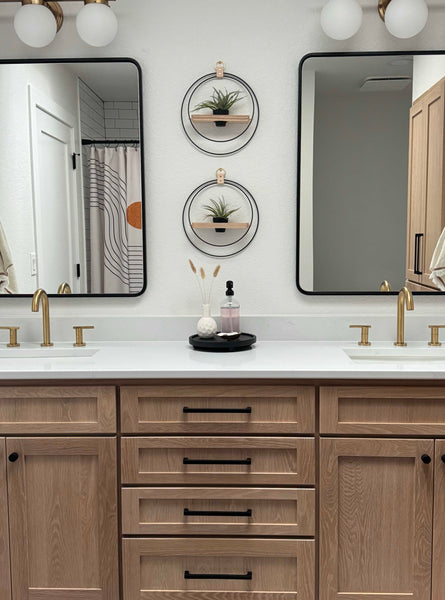 modern bathroom styled with unique wall decor