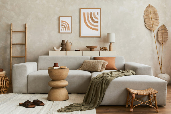 boho style living room with beige accent wall