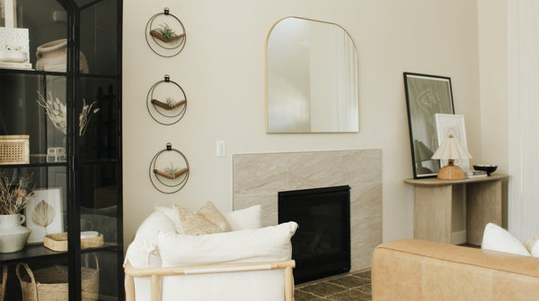 A trio of Kandis Cottage v-hangers styled in modern livingroom