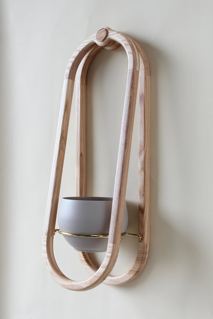 modern scandi inspired obround wall mounted planter with sand colored pot