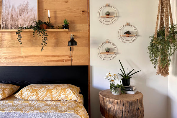 Kandis Cottage Plant Shelves styled next to bed in primary bedroom