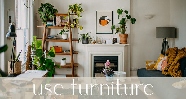 retro style living room filled with houseplants